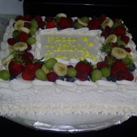 Mother's Day Cake This is a strawberry cake with strawberry filling and fresh fruit on top, made with fresh berries that my daughter and I picked ourselves...