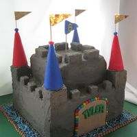 Castle Cake Funzy castle cake for a boy turning 6, buttercream castle with fondant accents