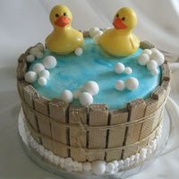 Ducky Cake Personally one of my favorites, this cake was made for parents-to-be expecting twins. This cake is covered in fondant, the barrel is made...