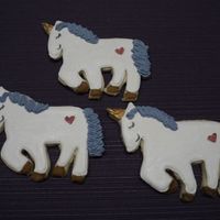 Unicorns Unicorns for my nieces 6th birthday party. Royal Icing with Luster Dust.