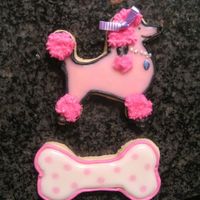Pink Poodles These are for my niece Vivian's first birthday party. The theme is of course, Pink Poodles. Toba's Glace and Royal Icing