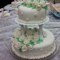 Course 3 Tiered Cake Course 3 rolled fondant tiered cake w/ fondant roses.