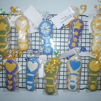 Baby Rattles These are made with Toba Garrett's Butter Cookies and MMF, The purple and gold rattles represent the Los Angeles Lakers!!! thanks for...