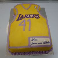 Newest Laker Player I made this cake for my hubby's 41st birthday. He is a true Laker's fan. The cake is a 2 layer yellow cake with chocolate filling...