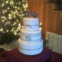 3 Tier Fondant Covered Wedding Cake With Forest Green Accents This is my first fondant covered multi-tier wedding cake. Top and Bottom tiers were Funfetti WASC, and middle tier was a plain WASC. All 3...