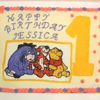 Pooh_Bear_1St_Bday.jpg 1st birthday cake with buttercream icing and my very first attempt at color flow. I was worried the color flow picture would disappear into...