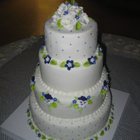 Wedding Cake With Purple Pansies I love pansies, so I was thrilled when the bride and groom wanted a purple and white wedding cake.