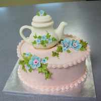 Teapot Cake This was a little oval cake I made for a friend's b-day. She loves teapots so I thought it would be perfect. The teapot is made out of...