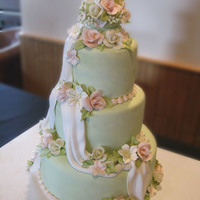 Salvaged Disaster I did this wedding cake for my cousin's daughter. I made the mistake of assembling the cake at home, trusting in the cake's...