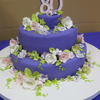Purple Passion This was a cake for my mother-in-law;s 80th birthday. She loves purple, so purple it is! She also loves butterflies so we had to have a few...