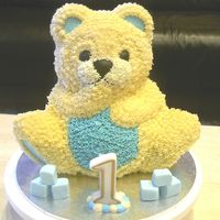 Teddy Bear 1St Birthday Cake Teddy bear cake using wilton stand up bear tin, buttercream icing.