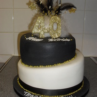 Black White Gold Topsy Turvy Cake i love this cake! i love contrasting cakes and the white black and gold just really work together!