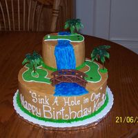 Miniature Golf Birthday Cake This was a 12" and 6" cake, White cake with buttercream. Fondantputt-putt greens. The bridge and trees are plastic. I hate to use...