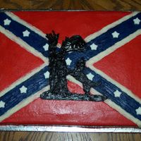 Coon Hunting Rebel flag with coon and coon dog. Buttercream decorations with fondant stars.