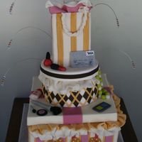 Fashion Victim my first try making this kind of cake, so it was very time consuming! but I am very happy with the results.The top of the boxes are...