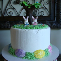 Easter Bunnies Fondant bunnies - rice krispie tree covered with fondant - fondant eggs on top and sides