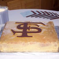 Chance's Team Cake is vanilla inside, caramel iced outside...caramel between the layers. As you see he is a Florida State Seminole Fan! (She had a FS...