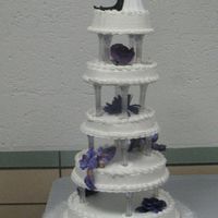 5 Tier Single Layer Round Wedding Cake this was one of my wedding cakes, each layer was a single layer, buttercream icing, fake flowers between the layers. We had two weddings so...