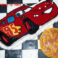 Lightning Mcqueen I used the Wilton Cars cake pan & covered the board in fondant. The RustEze emblem is also fondant & a great place for the birthday...