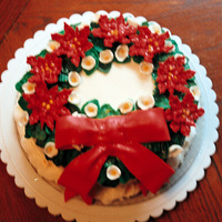 Poinsettia Cake This cake was for my SIL. She collects Avon collectible platters, etc in this beautiful reddish burgandy colr & I was trying to match...