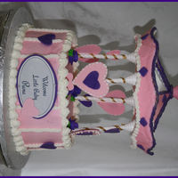 Welcome Baby Piana I used the Wilton Carousel Cake Set, I used the hearts instead of the horses, I could not imagine covering those horses in fondat, ALOT of...