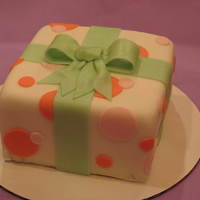 Present Cake This was my first attempt at covering a square cake in fondant. All details are fonant and gumpaste.