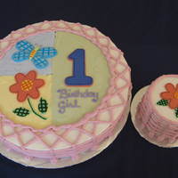 Hugs-N-Stitches Buttercream with fondant accents.