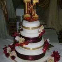 1St Wedding Cake This is the very first wedding cake I ever made! It's 5 layers (1 square with 4 rounds) of white cake filled with alternating layers...