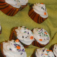 Fall Cupcakes Pumpkin cupcakes with Apple Spice Buttercream icing and sprinkles.
