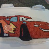 "cars" Cake This was for my nephew's 3rd birthday who LOVES "Cars." I used the Wilton pan. The only problem is that the cake is not very...