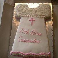 Dress Cake I actually made this cake for my daughter's christening but it could be used for a communion. Most of it is fondant but I had a very...