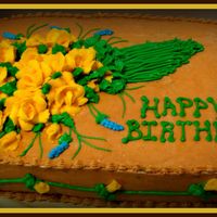 Bouquet Of Yellow Roses Caramel butter cream on white moist cake...cake is filled with caramel sauce throughout. This cake was inspired from one of Thanh Thanh...