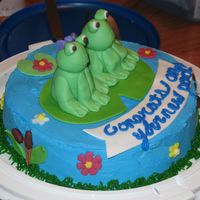 Welcome To Your New Pad! I made this 10" round chocolate cake, for a friend who just moved into a new house. She loves frogs, so we put a little spin on the...