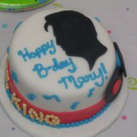 Elvis Birthday Cake. The king in cake! This was just a smal 6" round for my bosses brithday. White cake with buttercream and MMF.