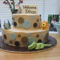 Baby Shower Cake This is my first attempt at a 2-tier cake. I still have a lot to learn, but it was a fun attempt.