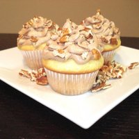 Nutella Cupcakes Vanilla cupcakes topped with a traditional buttercream frosting with about 1cup of Nutella yumminess added to it. Mmmmm...