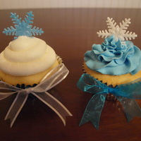 Snowflake Cupcakes! I recently made these for our local Ronald McDonald House. They are white cupcakes with buttercream frosting decorated with gumpaste...
