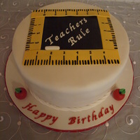 Christine's Birthday Cake This is a spice cake with cream cheese frosting decorated with a fondant chalkboard, rulers, and 2 little apples. Inspired by saj_stuff&#...