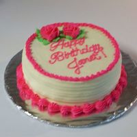 Simple Rose Birthday Yellow cake with butter frosting. I learned that it was my daughter's future mom-in-law's birthday and had just so-happened to...