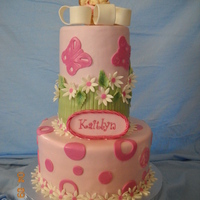 Daisies And Dots Daisies and Dots was made for a babys shower. Bottom tier is Raspberry cake with lemon mousse filling and buttercream, top tier is Almond...