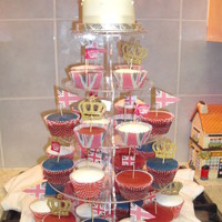 Royal Wedding Cupcake Tower Chocolate fudge cupcakes, vanilla cupcakes and iced fruit cake top tier.