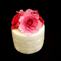 Peonies And Roses Gumpaste peonies and roses. Was made as a cut cake for a cupcakes wedding. First time making the peonies and after a few trial and error...