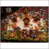 Protest Day At The Turkey Farm Rice Krispy haystacks; 50/50 turkeys, pig, and veggies. Signs are gumpaste ..