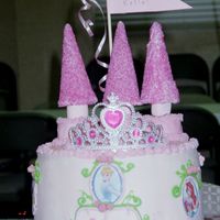 Katie's 3Rd Birthday Cake Three 9" rounds in buttercream. I had some cake trouble and ended up running out oftime on the towers. I used pink marshmallows on...