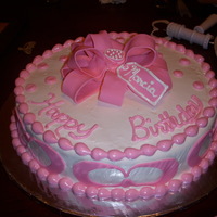 Coach Present Cake The bow and "C" are fondant. TFL