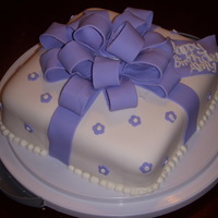 Fondant Present Cake I made this cake for class and end up giving it to a friend for her birthday. All fondant. TFL