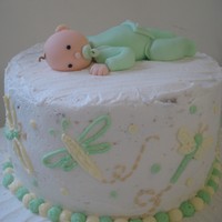 Dragonfly Baby Shower Cake With Fondant Baby Almond and cream cheese pound cake with buttercream icing. The baby is fondant, and all the other decoarations (except the ribbon) are...