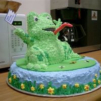 Frog Cake The frog is actually created using the Wilton 3-d bear pan. The tongue is made from candy clay on a stick. This one was a lot of fun to...