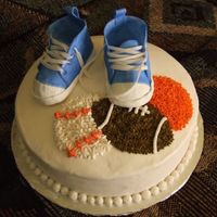 Sports Baby Shower sports theme baby shower, gumpaste shoes on vanilla cake with bc icing