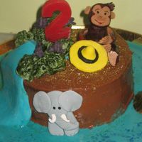 Curious George This chocolate sponge cake with chocolate italian buttercream and chocolate ganache filling was a last mintue. 8 hours to be exact birthday...